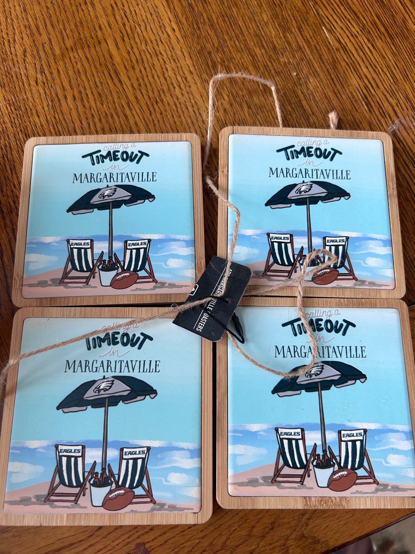 Calling a time out in Margaritaville Eagles wooden cup coaster set
