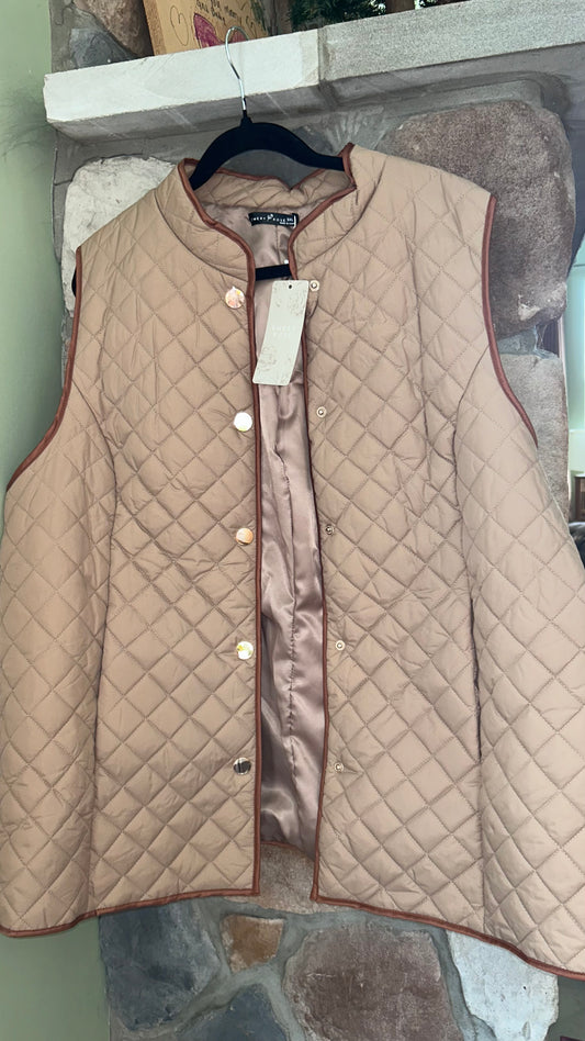 Woman’s size 5X vest fit smaller like a 16/18 new tags