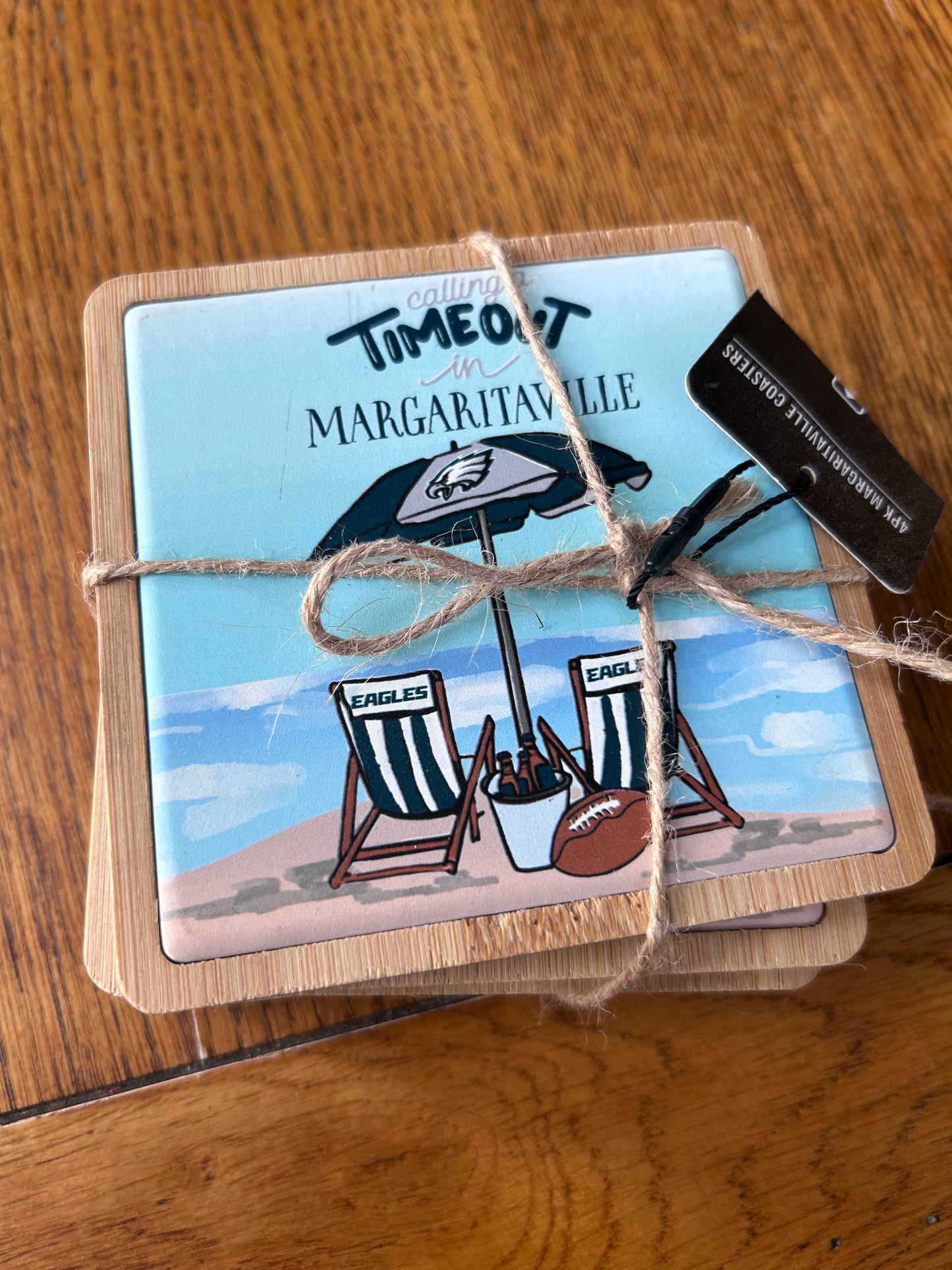 Calling a time out in Margaritaville Eagles wooden cup coaster set